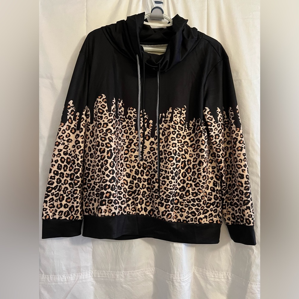 Leopard print pullover.